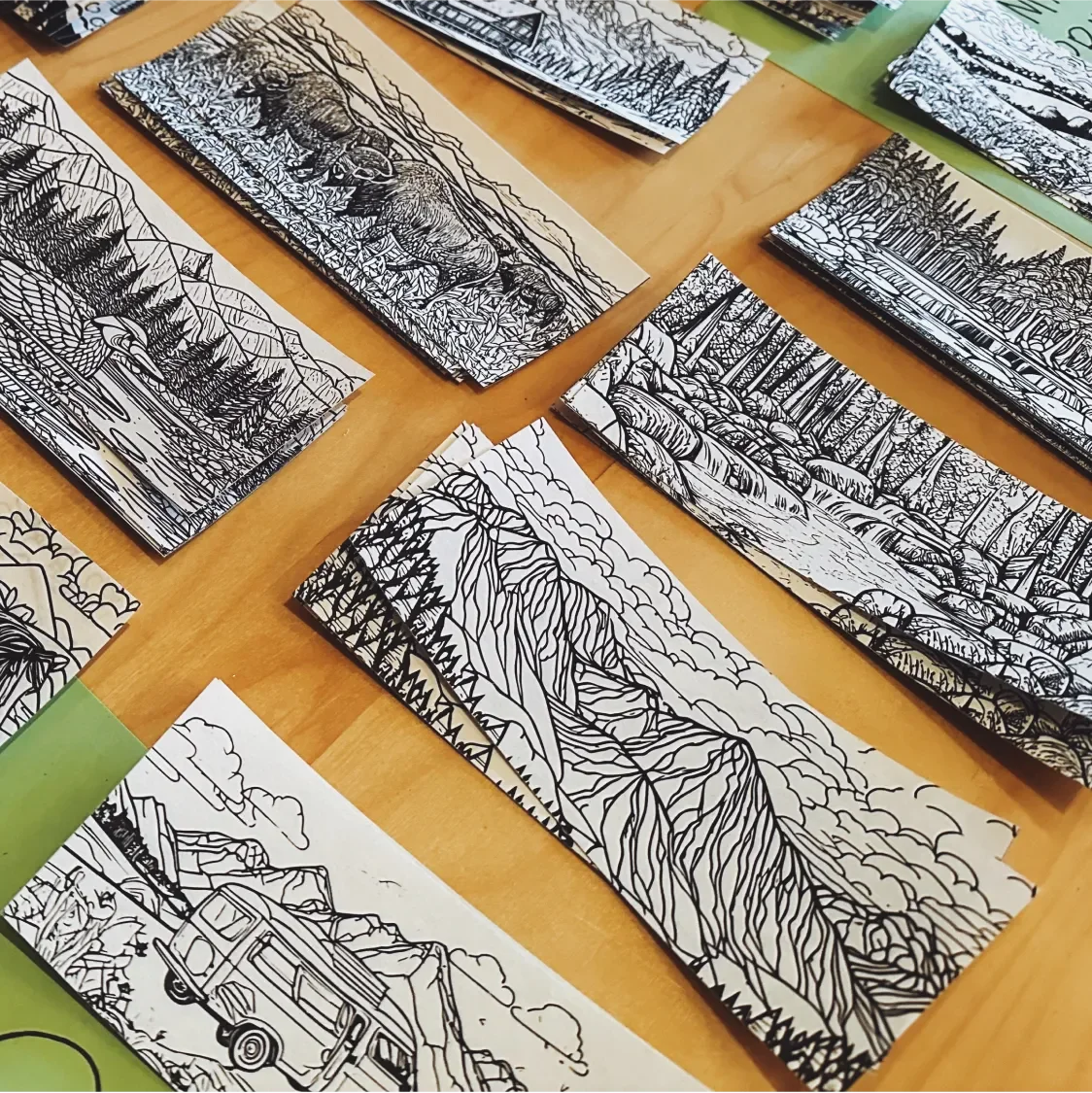 Coloring book pages featuring outdoor landscapes