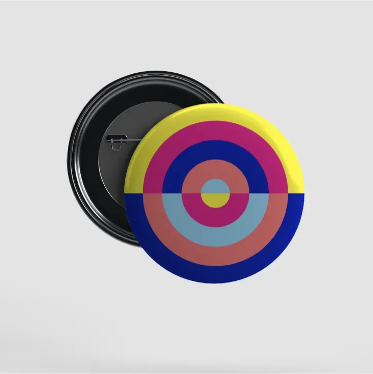 Front and back of button showing what looks like a target in an arrangement of brand colors