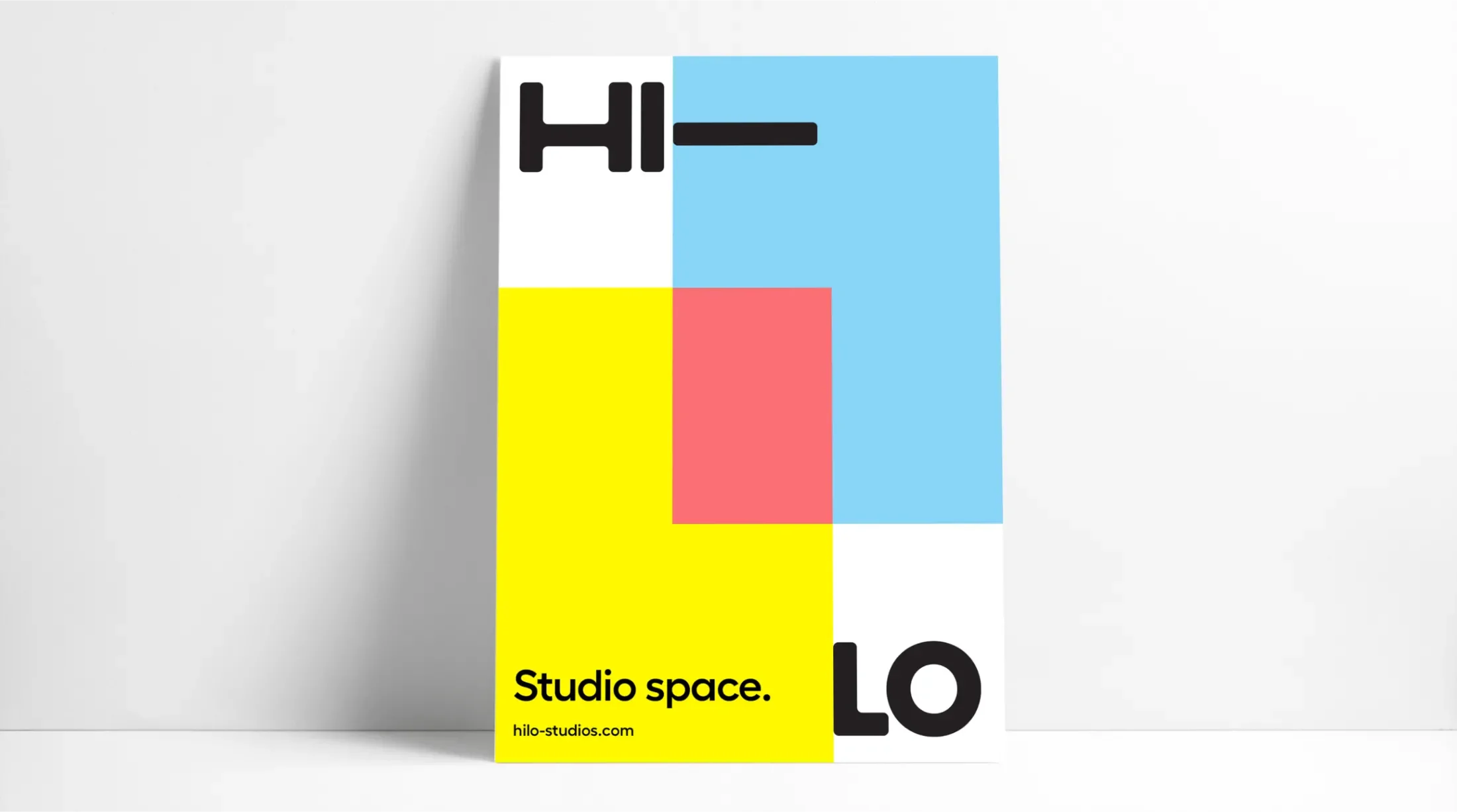 Hi-Lo poster with two overlapping rectangles in the brand colors with the caption "Studio space."